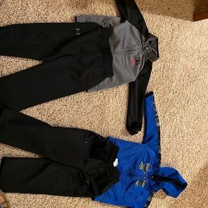 (2) Under Armour 3T tracksuits.